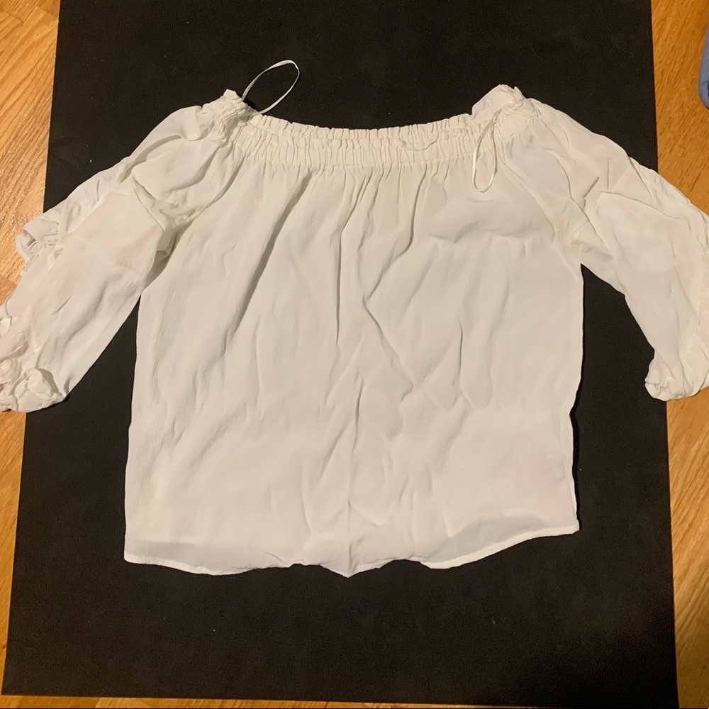 Off-the-shoulder white half-sleeve top